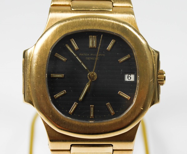 Patek Philippe Nautilus Geneve Armband Uhr in Gold mit Schwarzem Zifferblatt Swiss made